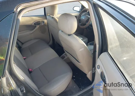 2003 Ford Focus Zts z USA, uszkodzony, nr VIN 1FAHP38323W251074